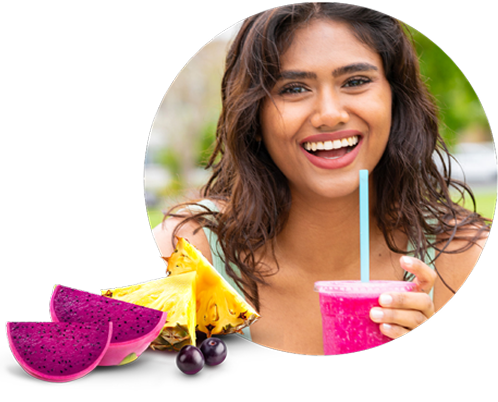 Smiling woman with nekter smoothie and fruit