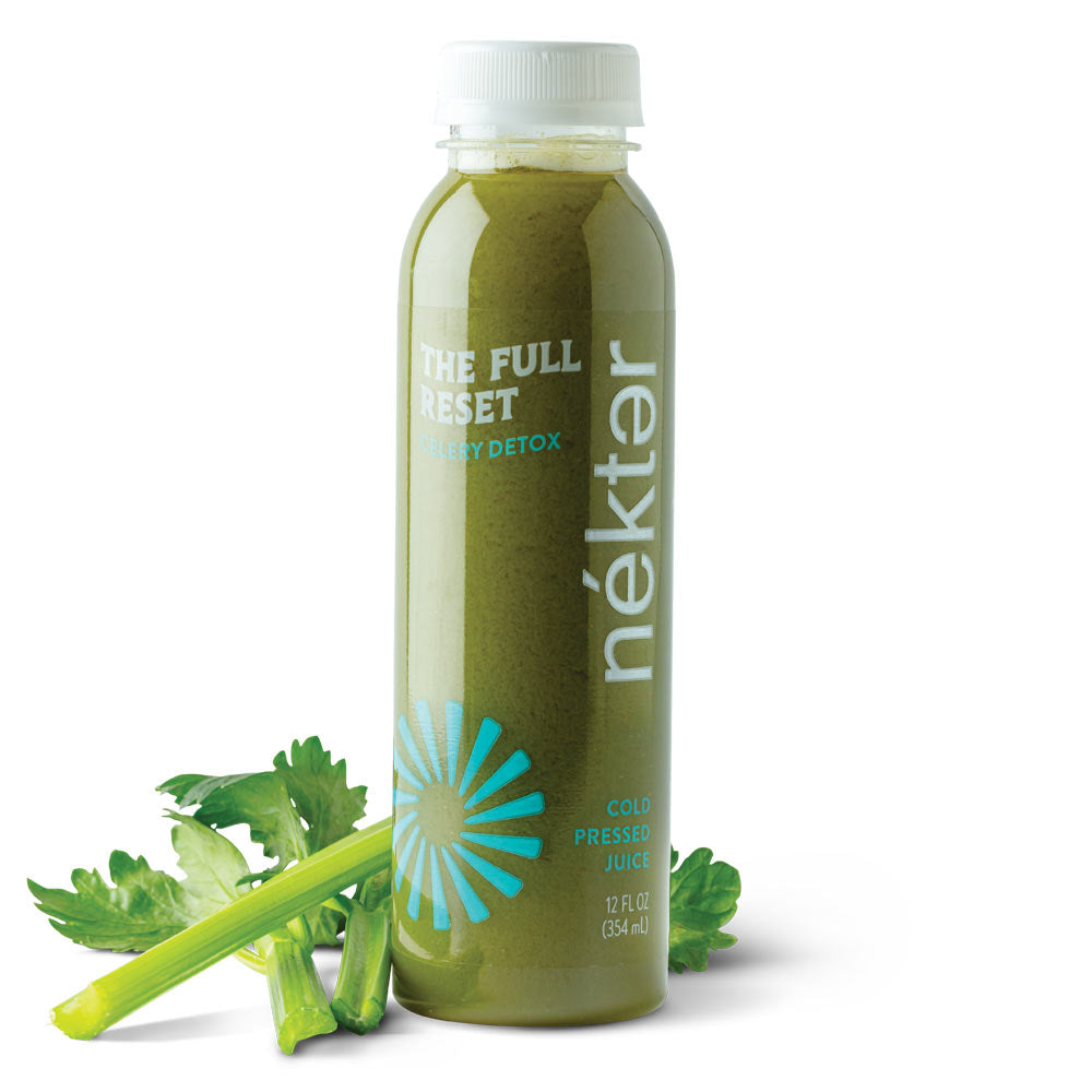 The Full Reset bottled juice shown with celery