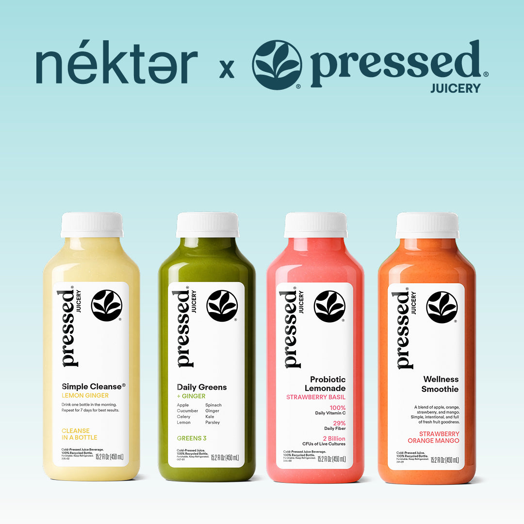 Four bottled juices from pressed juicery lined up against a light blue background, with the nékter x pressed juicery logo above. The bottles are in lemonade, orange, strawberry lemonade, and wellness smoothie flavors.