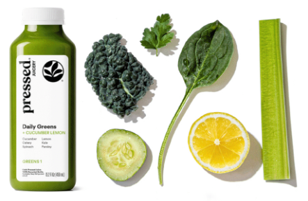 Bottle of 'Pressed' Daily Greens with kale, lemon, cucumber, and celery on a white background